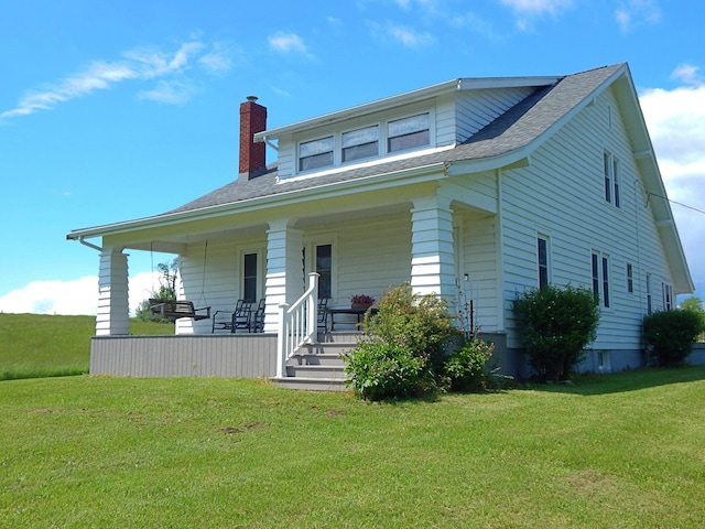 2705 County Road 118, Rushsylvania, OH 43347 - bungalow with a porch, a front lawn, a chimney, and roof with shingles