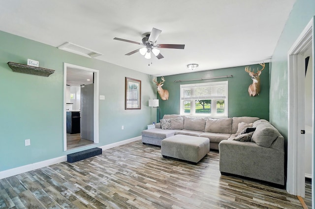 12955 State Route 188, Thornville, OH 43076 - living room with attic access, wood finished floors, baseboards, and a ceiling fan