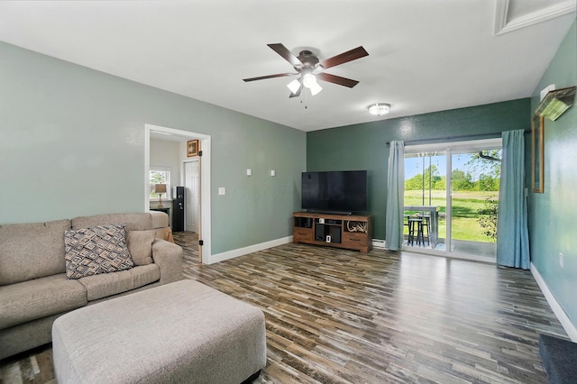 12955 State Route 188, Thornville, OH 43076 - living area featuring wood finished floors, ceiling fan, healthy amount of natural light, and baseboards
