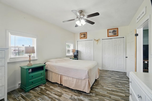 12955 State Route 188, Thornville, OH 43076 - bedroom with two closets, dark wood-type flooring, and ceiling fan