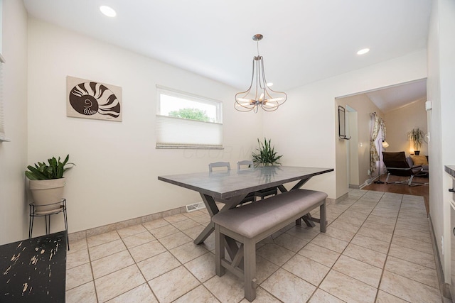 dining space featuring a chandelier, recessed lighting, and light tile patterned flooring