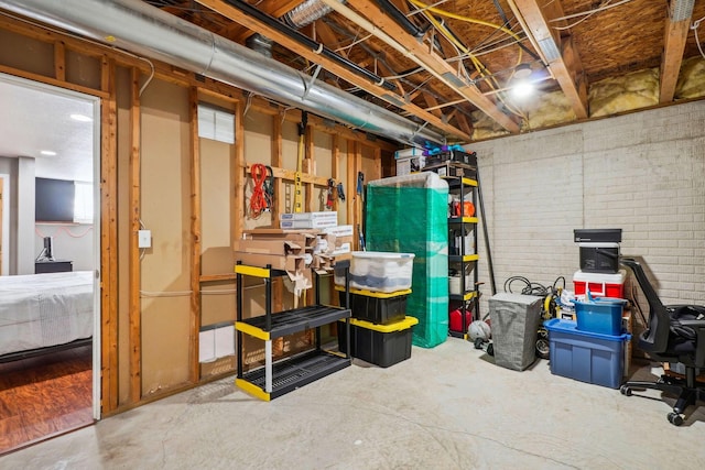 unfinished basement with brick wall