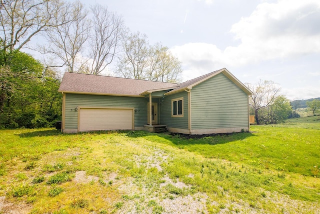 7885 Upper Twin Rd, South Salem, OH 45681 - view of front of house featuring a garage and a front lawn