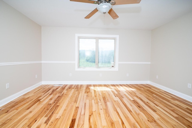 7885 Upper Twin Rd, South Salem, OH 45681 - spare room featuring light wood-type flooring, baseboards, and a ceiling fan