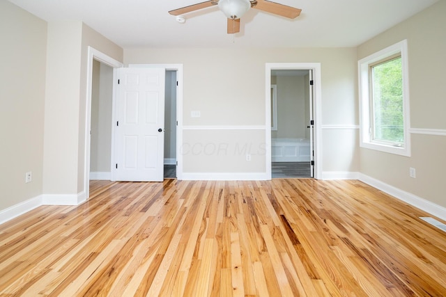 7885 Upper Twin Rd, South Salem, OH 45681 - empty room with wood finished floors, a ceiling fan, and baseboards