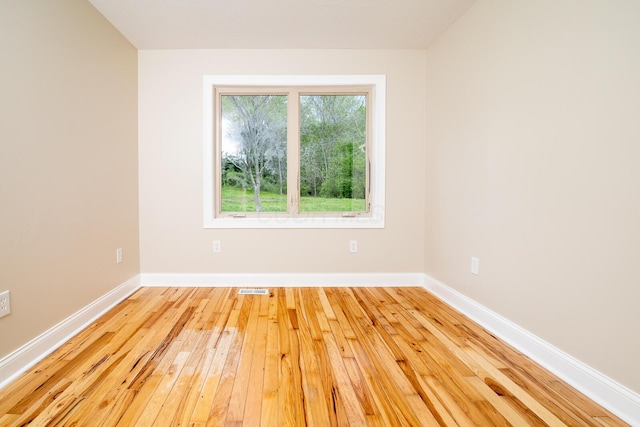 7885 Upper Twin Rd, South Salem, OH 45681 - spare room with hardwood / wood-style flooring and baseboards