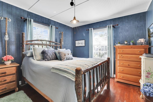 7677 Opossum Run Rd, London, OH 43140 - bedroom with hardwood / wood-style flooring, multiple windows, and wallpapered walls