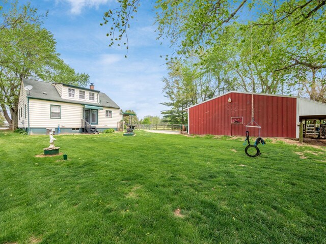 7677 Opossum Run Rd, London, OH 43140 - view of yard featuring an outbuilding, an outdoor structure, and entry steps