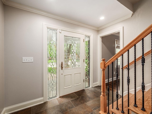 entrance foyer featuring ornamental molding, baseboards, stone tile floors, recessed lighting, and stairs