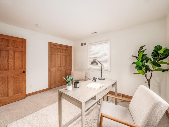 office area featuring carpet flooring and baseboards