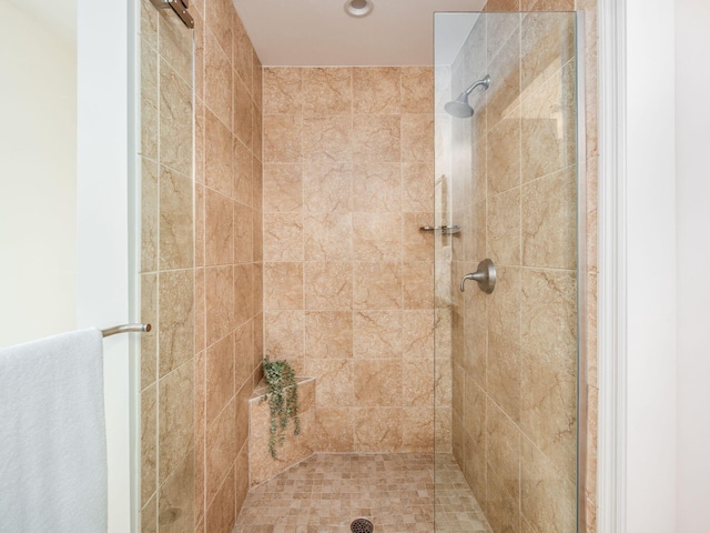 bathroom featuring a stall shower
