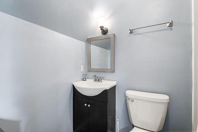 8950 Woodhaven Rd, Johnstown, OH 43031 - half bathroom featuring vanity, vaulted ceiling, and toilet
