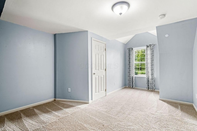 8950 Woodhaven Rd, Johnstown, OH 43031 - bonus room featuring carpet flooring, baseboards, and lofted ceiling