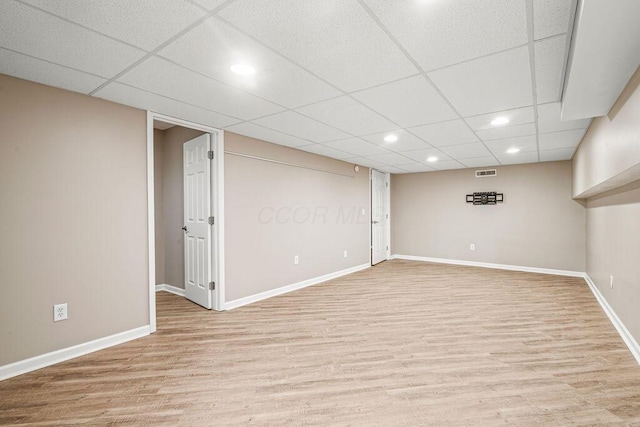 8950 Woodhaven Rd, Johnstown, OH 43031 - finished below grade area featuring light wood finished floors, baseboards, recessed lighting, and a drop ceiling