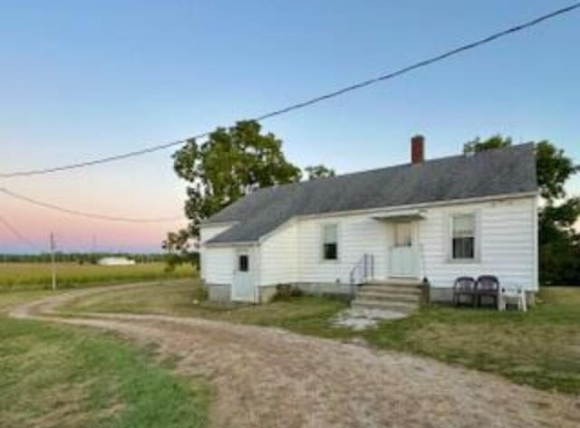 7378 Irvin Shoots Rd W, Morral, OH 43337 - rear view of property featuring a chimney and driveway