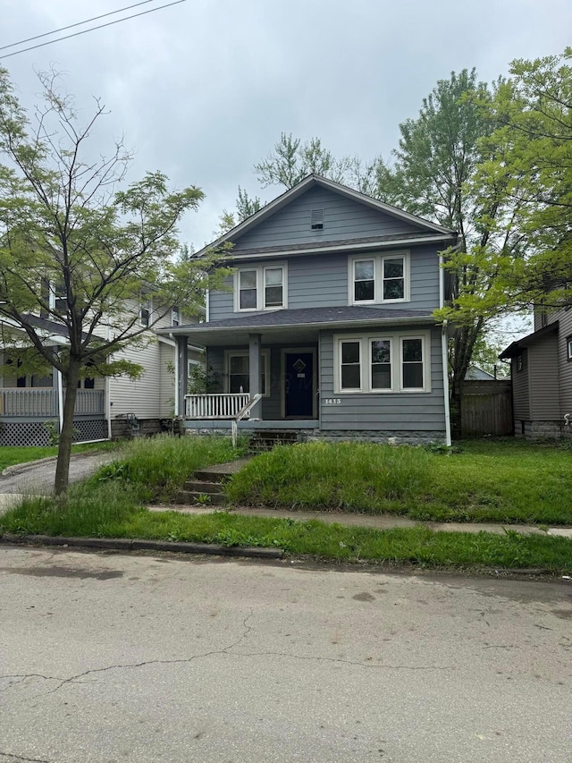 1413 Minnesota Ave, Columbus, OH 43211 - view of front of property with a porch and fence