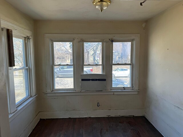 1413 Minnesota Ave, Columbus, OH 43211 - unfurnished dining area with dark wood-style flooring and healthy amount of natural light