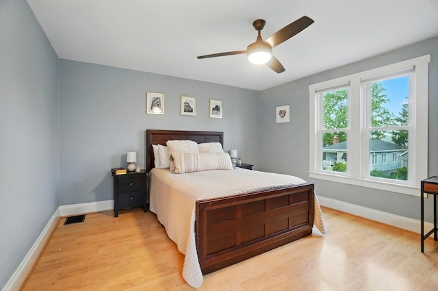 1545 Westwood Ave, Columbus, OH 43212 - bedroom with light wood finished floors, baseboards, and a ceiling fan