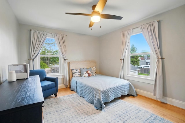 1545 Westwood Ave, Columbus, OH 43212 - bedroom with wood finished floors, baseboards, and a ceiling fan