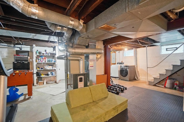 1545 Westwood Ave, Columbus, OH 43212 - below grade area with washing machine and clothes dryer, stairway, and heating unit
