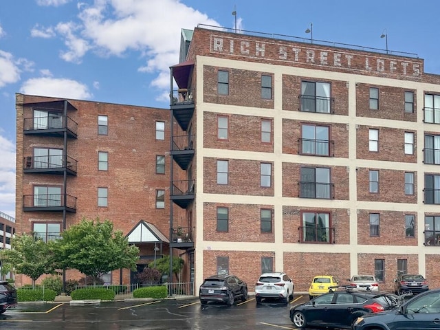 432 E Rich St Unit 3K, Columbus, OH 43215 - view of apartment building / complex featuring uncovered parking