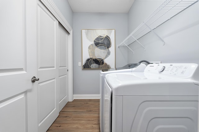 243 Parkgate Ct, Delaware, OH 43015 - washroom with washer and clothes dryer, wood finished floors, and baseboards