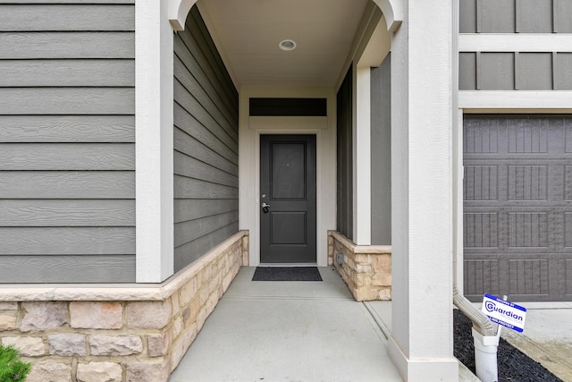 243 Parkgate Ct, Delaware, OH 43015 - view of exterior entry with stone siding