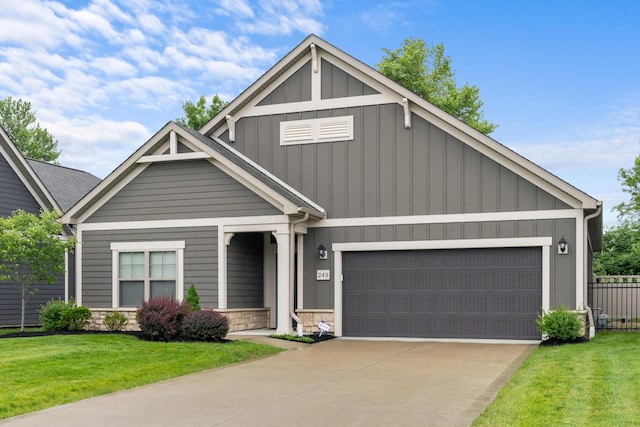 243 Parkgate Ct, Delaware, OH 43015 - craftsman-style house featuring board and batten siding, an attached garage, and a front lawn