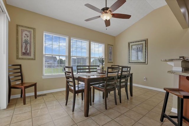 135 Tassel View St, Pataskala, OH 43062 - dining area with vaulted ceiling, healthy amount of natural light, ceiling fan, and baseboards