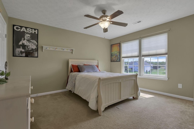 135 Tassel View St, Pataskala, OH 43062 - bedroom featuring light carpet, baseboards, a textured ceiling, and ceiling fan