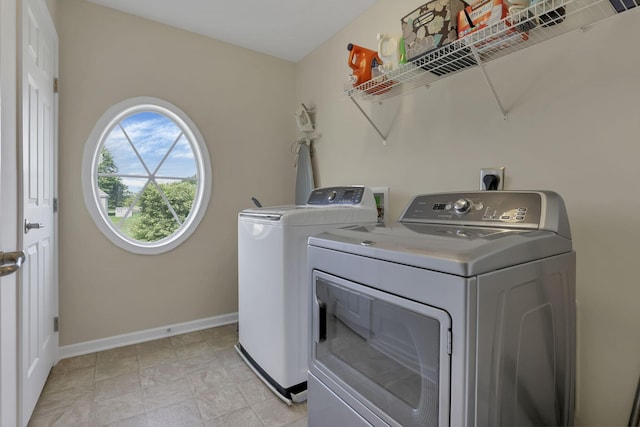 135 Tassel View St, Pataskala, OH 43062 - washroom with washer and clothes dryer and baseboards