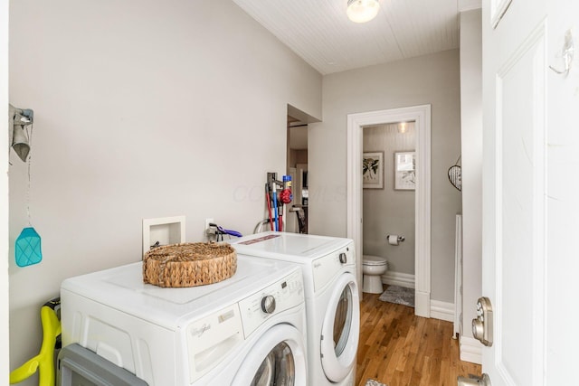1105 Say Ave, Columbus, OH 43201 - washroom featuring washer and dryer and light wood-type flooring