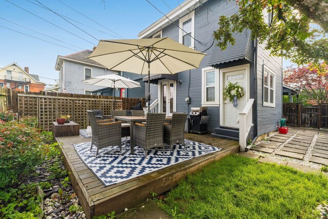 1105 Say Ave, Columbus, OH 43201 - rear view of property with entry steps, outdoor dining space, and a wooden deck