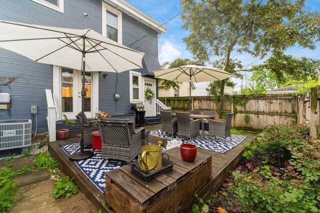 1105 Say Ave, Columbus, OH 43201 - wooden terrace featuring outdoor dining space, central AC, and french doors