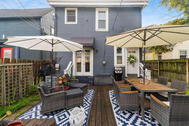 1105 Say Ave, Columbus, OH 43201 - wooden deck with french doors, outdoor dining area, and an outdoor living space
