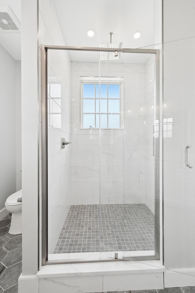 268 E Gay St Unit Th38, Columbus, OH 43215 - bathroom with toilet, a stall shower, and recessed lighting