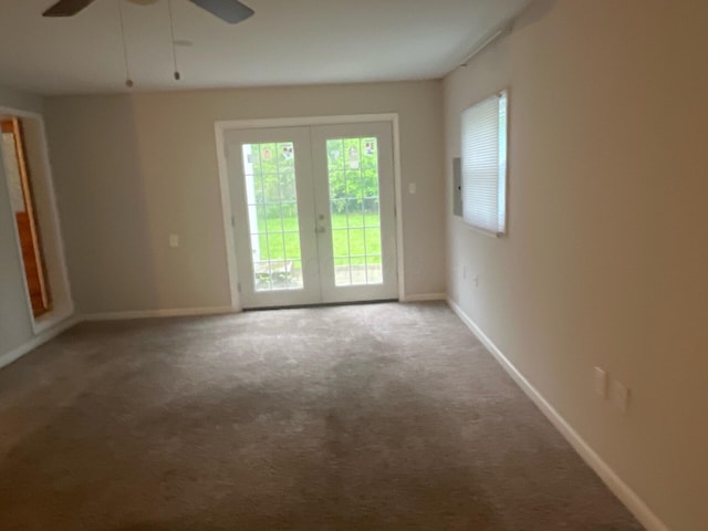 1227 Hart Rd, Columbus, OH 43223 - unfurnished room with carpet, a ceiling fan, baseboards, and french doors