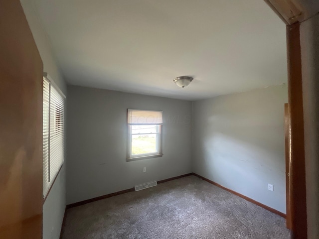 1227 Hart Rd, Columbus, OH 43223 - carpeted spare room featuring baseboards