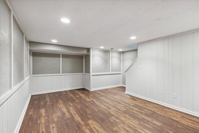 2713 Summer Dr, Dublin, OH 43016 - finished basement with wood finished floors, a textured ceiling, and recessed lighting