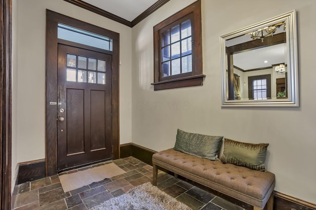 1041 Franklin Ave, Columbus, OH 43205 - entrance foyer with stone tile floors, crown molding, healthy amount of natural light, and baseboards
