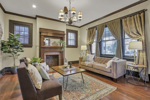 1041 Franklin Ave, Columbus, OH 43205 - living area with wood finished floors, a chandelier, ornamental molding, a fireplace, and baseboards