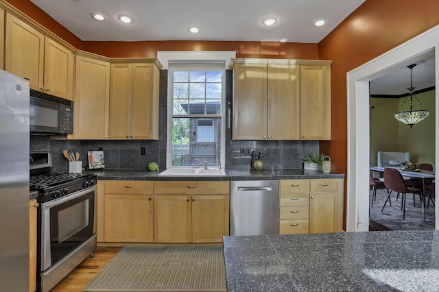 1041 Franklin Ave, Columbus, OH 43205 - kitchen featuring appliances with stainless steel finishes, a sink, light brown cabinets, tasteful backsplash, and recessed lighting