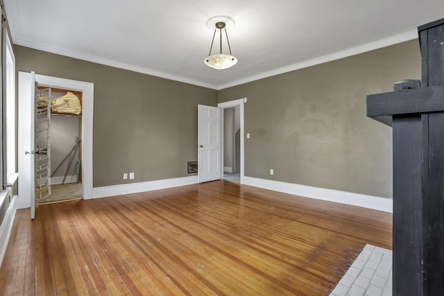 1041 Franklin Ave, Columbus, OH 43205 - unfurnished room with wood-type flooring, ornamental molding, and baseboards