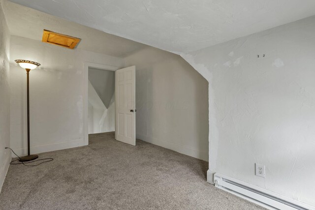 1041 Franklin Ave, Columbus, OH 43205 - bonus room with a baseboard heating unit, carpet floors, vaulted ceiling, and baseboards
