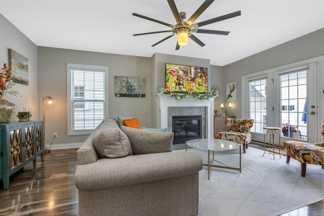 5119 Butterworth Green Dr, New Albany, OH 43054 - living area with ceiling fan, a fireplace, wood finished floors, and baseboards
