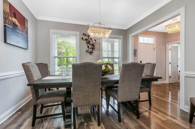 5119 Butterworth Green Dr, New Albany, OH 43054 - dining room with a chandelier, wood finished floors, ornamental molding, and baseboards