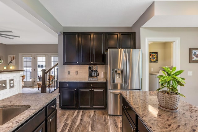 5119 Butterworth Green Dr, New Albany, OH 43054 - kitchen with stainless steel fridge, ceiling fan, wood finished floors, light stone counters, and tasteful backsplash