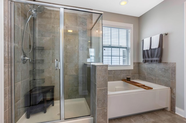 5119 Butterworth Green Dr, New Albany, OH 43054 - bathroom featuring a stall shower, a bath, and recessed lighting