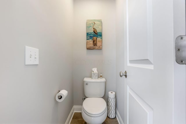 5119 Butterworth Green Dr, New Albany, OH 43054 - bathroom with baseboards, toilet, and tile patterned floors