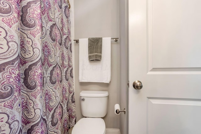 5119 Butterworth Green Dr, New Albany, OH 43054 - full bathroom featuring toilet and a shower with shower curtain